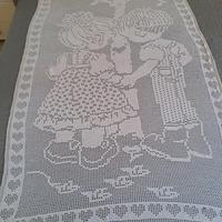 Copertina per culla fatta a mano all’uncinetto
