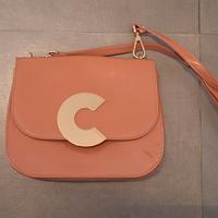 Borsa Coccinelle lucida a tracolla