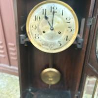 Orologio antico a pendolo