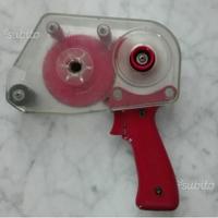 Pistola dispenser per nastro biadesivo