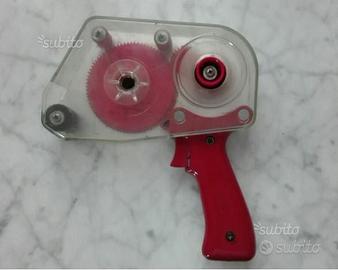 Pistola dispenser per nastro biadesivo