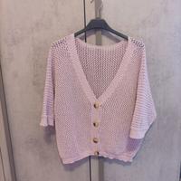 golfino rosa con maniche tre quarti.