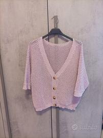 golfino rosa con maniche tre quarti.