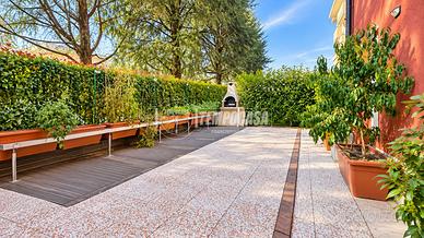 Bilocale con giardino, box e cantina