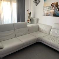 Divano angolare di pelle bianco