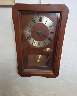 Orologio a pendolo da muro