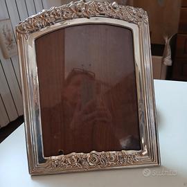 Cornice argento