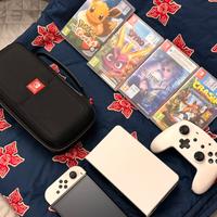 Nintendo Switch 1 oled + 5 giochi + accessori