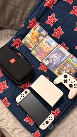 Nintendo Switch 1 oled + 5 giochi + accessori