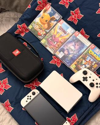 Nintendo Switch 1 oled + 4 giochi + accessori