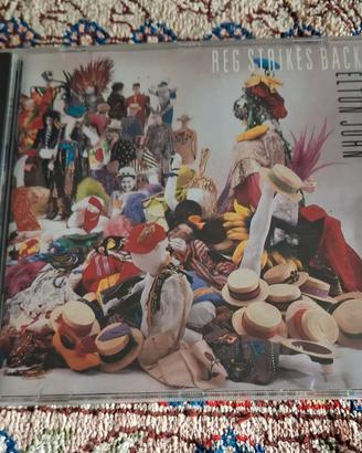 CD di Elton John - Reg Strikes Back