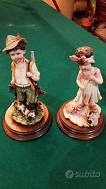 coppia figurine il cacciatore e la piccola massaia