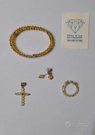 Bracciale, anello, crocetta, orecchini