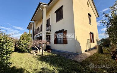 ESCLUSIVO QUADRILOCALE CON TAVERNA E GIARDINO