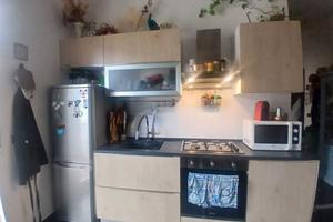 Quarto grazioso appartamento arredato con balcone