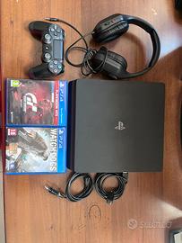 ps4 slim + controller + cuffie + 2 giochi