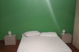 Stanza verde con bagno privato