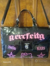 Borsa grande lucida nera e rosa 