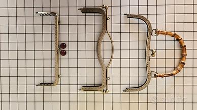 Chiusure per borse clip clap e manici