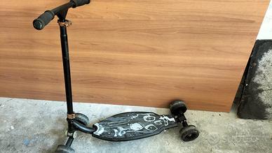 monopattino a quattro ruote oxelo