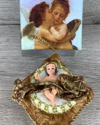 Bambino Gesù su cuscino con scatolo dedicato