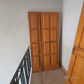 porte il legno e portoncino in  noce massello .