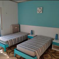 Stanza singola con letto matrimoniale