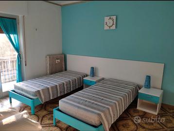 Stanza singola con letto matrimoniale