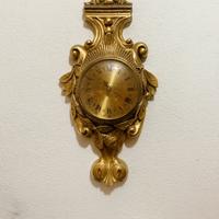 Orologio da parete in legno dorato stile barocco