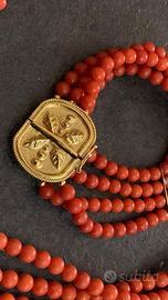 Collana e bracciale con fermaglio in oro