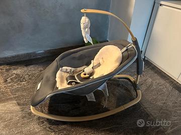 Sedia a dondolo con giochi in legno