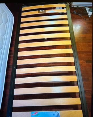 Letto singolo compreso di rete