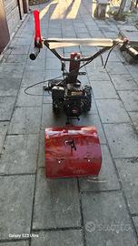 Motocoltivatore con barra falciante