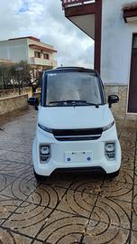 scooter elettrico cabinato a 4 ruote per disabili 