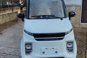 scooter elettrico cabinato a 4 ruote per disabili 