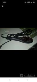 Piastra stira capelli a forma di spazzola