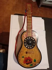 Carillon portagioie vintage a forma di chitarra 