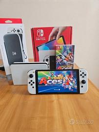 Nintendo Switch Oled + Gioco e accessori