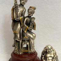 Antiche statuine argentate