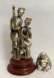 Antiche statuine argentate