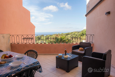 Isola Rossa La Paduledda Casa Vacanza Family room