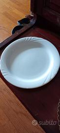 4 PIATTI  GRANDI IN PORCELLANA SEMINUOVI