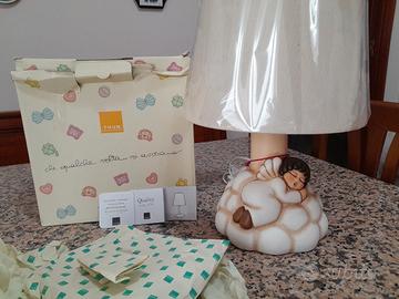 lampada da tavolo thun con angelo sulla nuvola che