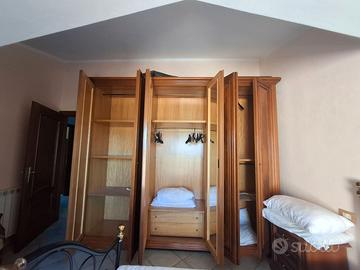 Camera da letto in legno massello