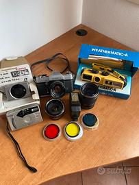 macchine fotografiche e obbiettivi