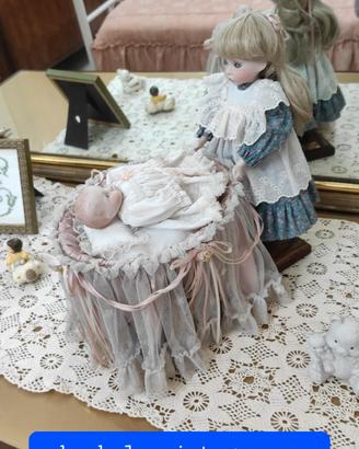 bambola vintage con neonato