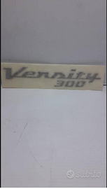 -Emblema fianchetto XC Versity 300 5SE2173B0000