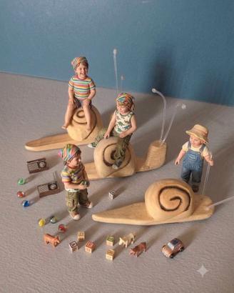 TRE PICCOLE LUMACHE CALAMITA IN LEGNO