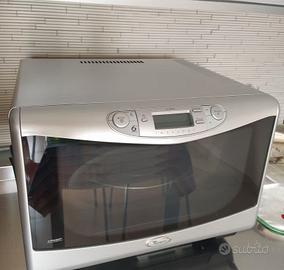 Microonde Whirlpool 1000W + acc. + ricettario DVD