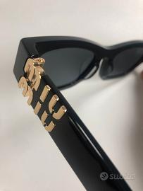 Occhiali da sole con monogramma Miumiu